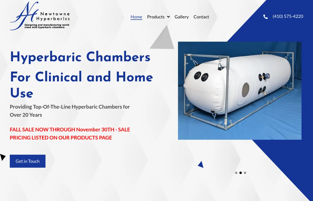 Newtowne Hyperbarics homepage with the headline Hyperbaric Chambers For Clinical and Home Use beside a white inflatable chamber on a metal frame
