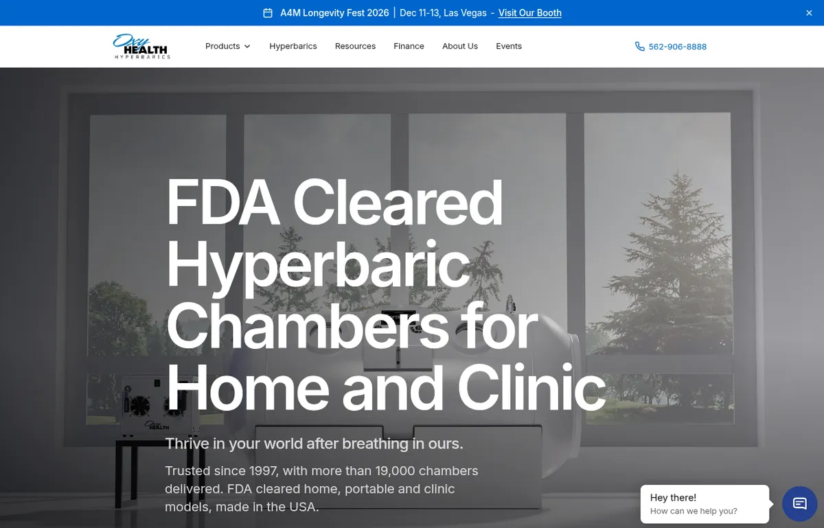 OxyHealth homepage with the headline FDA Cleared Hyperbaric Chambers for Home and Clinic over a grey room with a chamber by the window