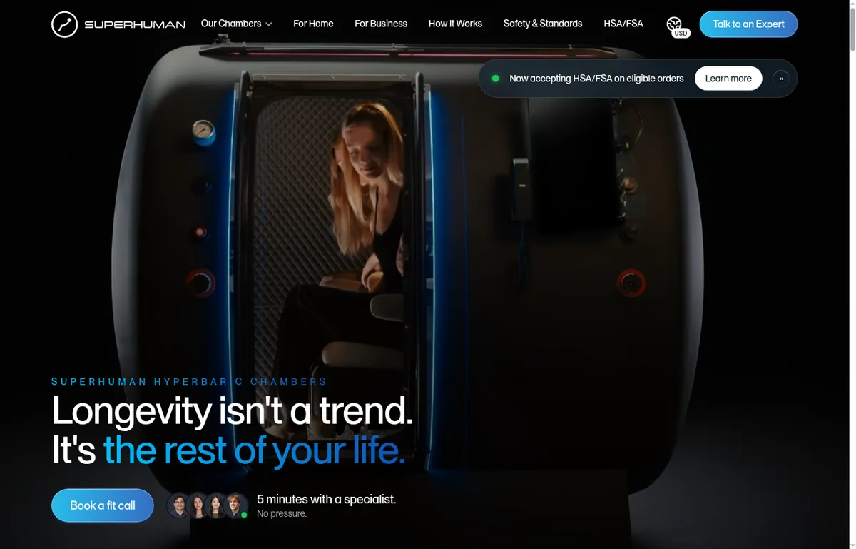 Superhuman homepage with a woman seated inside a dark hard-shell chamber and the headline Longevity isn't a trend